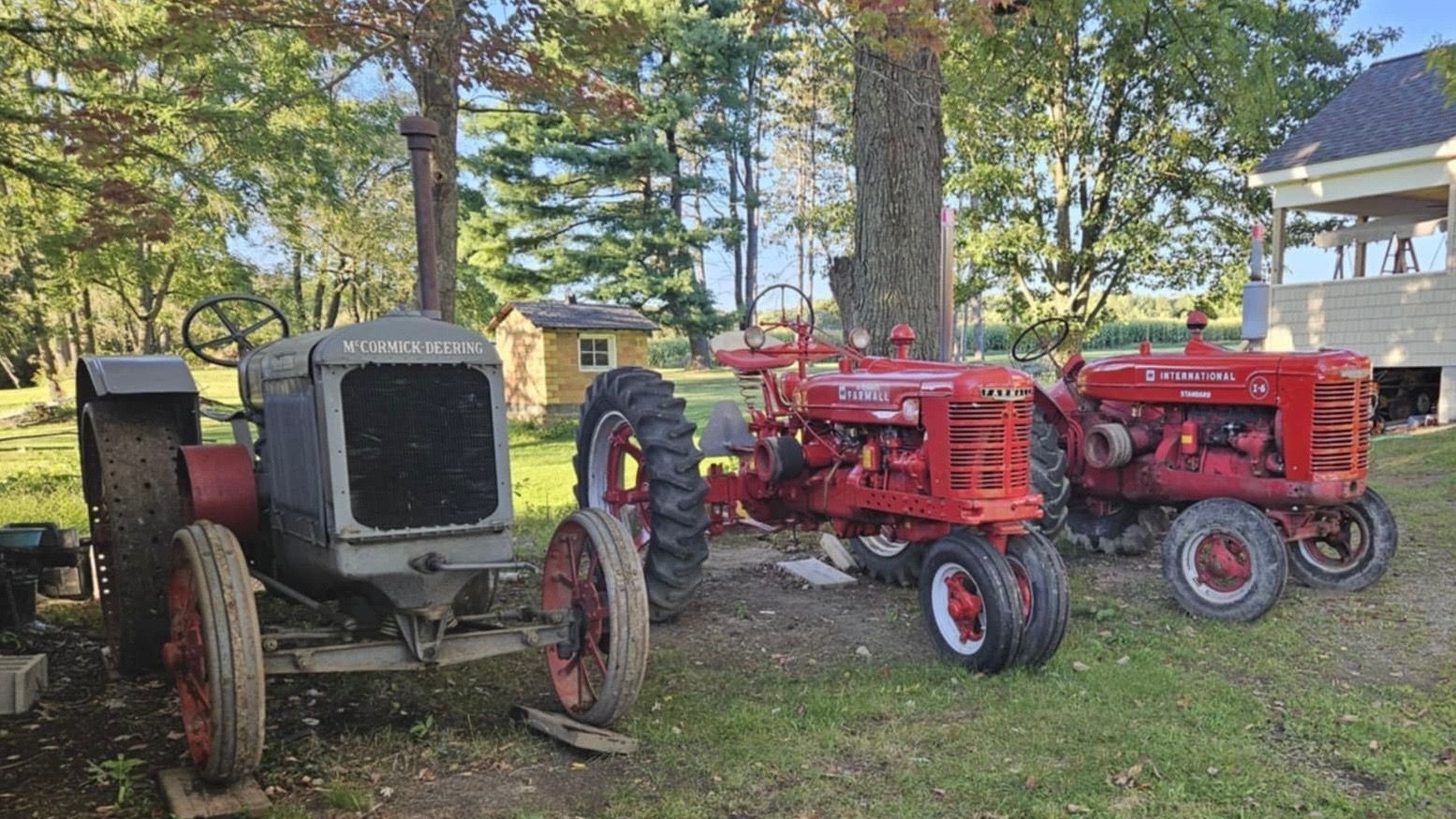 Three vintage tractors at Rice Equipment Inc — McCormick-Deering, Farmall, and International — new old stock parts catalog hero